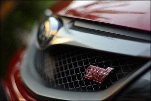 subaru wrx sti logo grille red