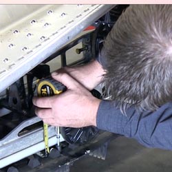 Adjust snowmobile track