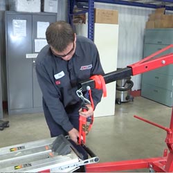 Adjust snowmobile track