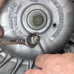 Snowmobile belt deflection