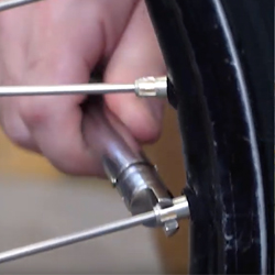 True dirt bike rim, tension spokes