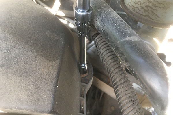 Remove air filter housing cover