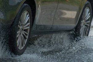 Puddles in winter can contribute to rust on a car.