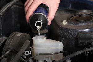Adding brake fluid while bleeding brakes. 