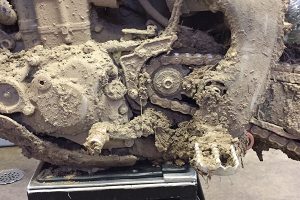 Muddy dirt bike chain.