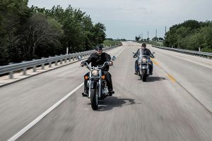 Motorcycles riding down the highway. 