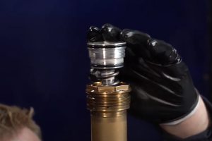 Installing compression assembly in dirt bike forks.