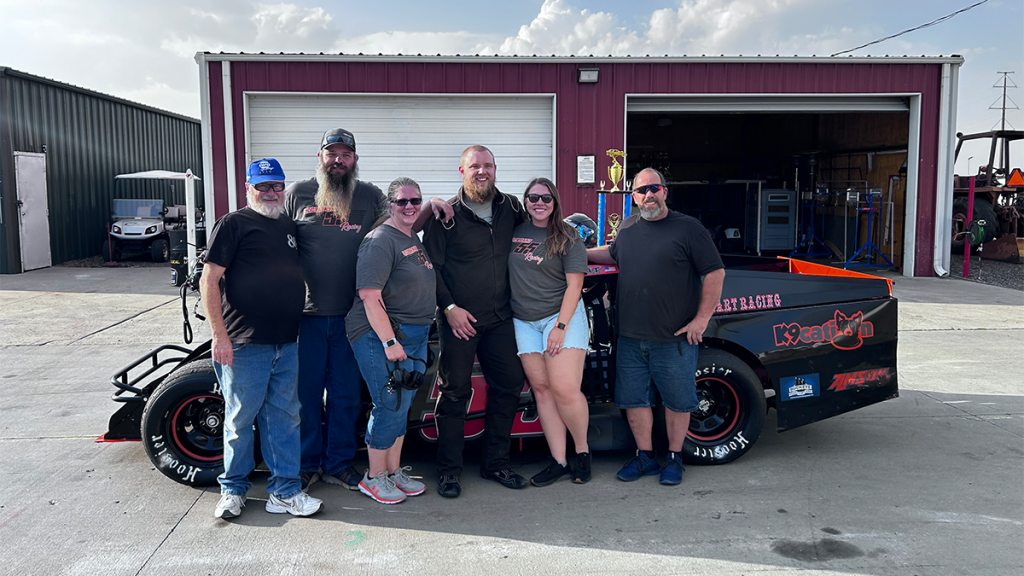 The Lockhart racing family with their race car.